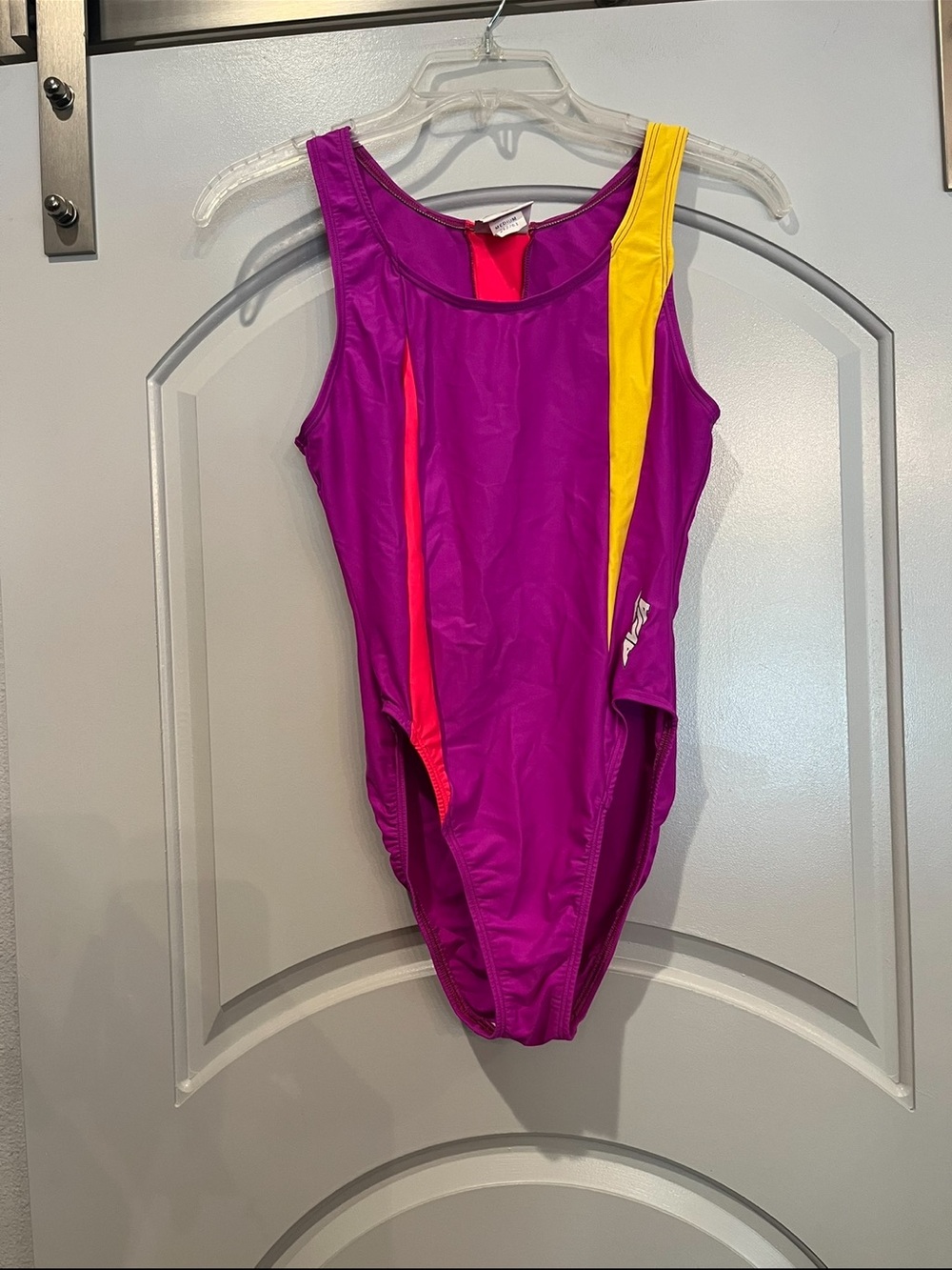 Vintage Avia Purple One-Piece gymnastics leotard with Yellow& red Accents. GUC!